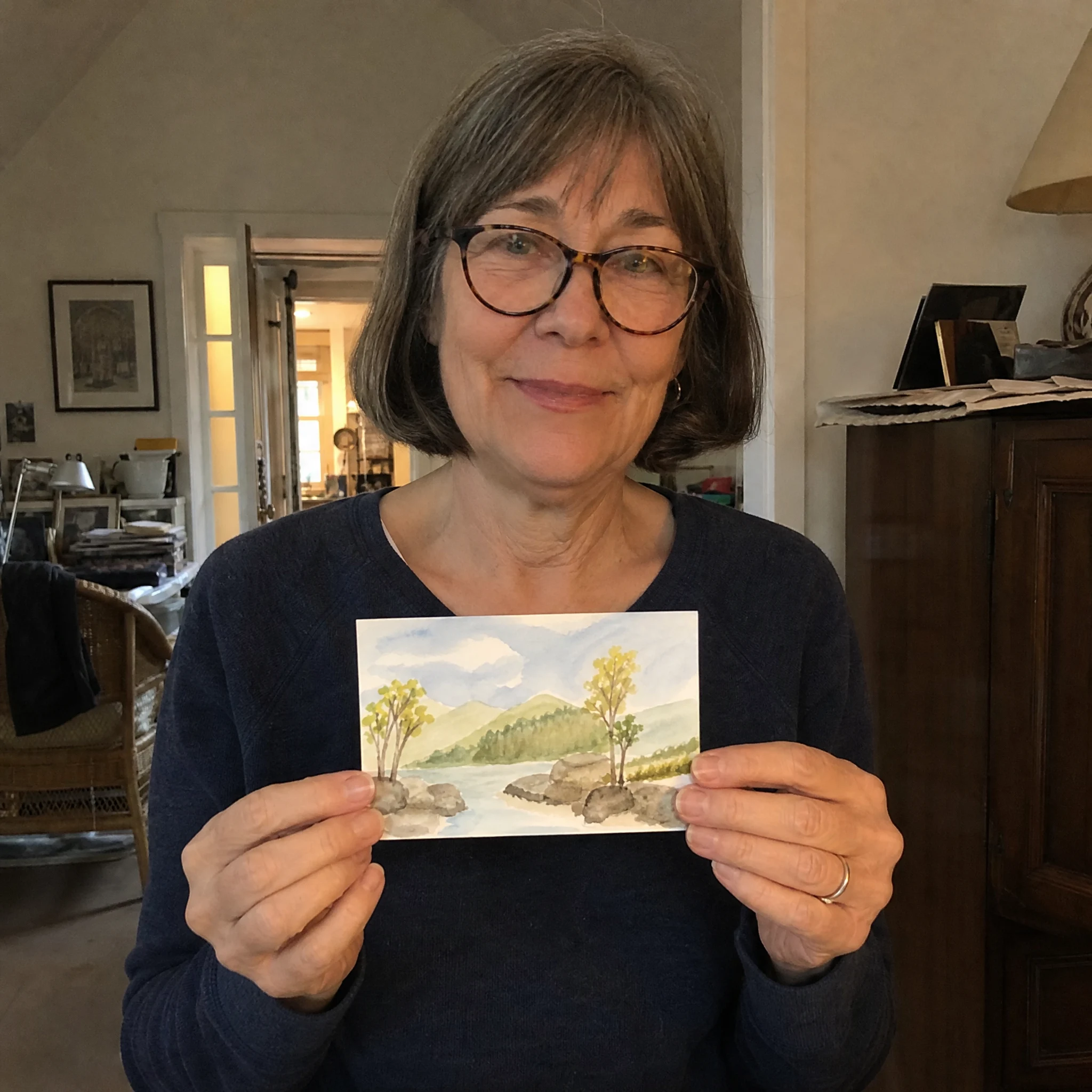 Marion S. holding her first finished ink cat